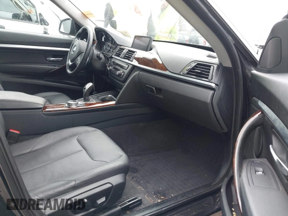 2014 BMW 3 Series 328i Gran Turismo xDrive z VIN WBA3X5C51ED558871, wystawiony jako IAAI lot #41940706 z przebiegiem 74 126 mil mil oraz . Historia ofert i sprzedaży dostępna na DreamBid. Obrazek 5.