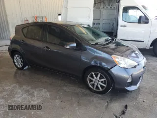 2014 Toyota Prius One with VIN JTDKDTB32E1067318, listed as a Copart auction lot 52731255 with 125,239 mi miles and Salvage Title. Bid and sale history available at DreamBid. Image 4.