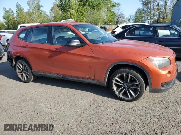 2014 BMW X1 xDrive28i z VIN WBAVL1C50EVY11864, wystawiony jako Copart lot #54181865 z przebiegiem 84 636 mil mil oraz Szkoda całkowita • Salvage title. Historia ofert i sprzedaży dostępna na DreamBid. Obrazek 4.