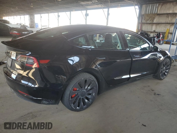 2021 Tesla Model 3 Performance with VIN 5YJ3E1EC0MF060360, listed as a Copart auction lot 43315195 with 28,726 mi miles and Salvage Title. Bid and sale history available at DreamBid. Image 3.