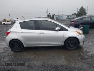2013 Toyota Yaris L with VIN JTDKTUD32DD553842, listed as a IAAI auction lot 41231910 with 155,158 mi miles. Bid and sale history available at carsss.com. Image 13.