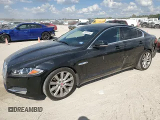 2014 Jaguar XF SC with VIN SAJWA0EX2E8U21886, listed as a Copart auction lot 76783344 with 97,280 mi miles and Salvage Title. Bid and sale history available at DreamBid. Image 1.