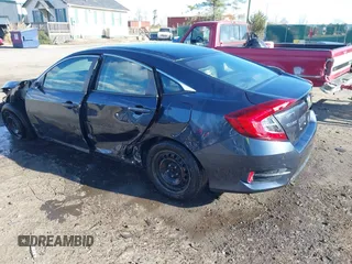 2017 Honda Civic LX with VIN 19XFC2F52HE069033, listed as a IAAI auction lot 41866390 with 68,050 mi miles and . Bid and sale history available at DreamBid. Image 3.