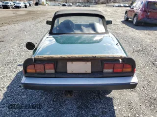 1983 Alfa Romeo Spider Veloce z VIN ZARBA541XD1016802, wystawiony jako Copart lot #51383595 z przebiegiem 127 904 mil mil oraz Czysty tytuł • Clean title. Historia ofert i sprzedaży dostępna na DreamBid. Obrazek 6.