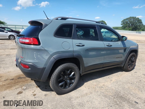 2015 Jeep Cherokee Trailhawk with VIN 1C4PJMBS4FW687328, listed as a Copart auction lot 58927765 with 119,483 mi miles and Non repairable. Bid and sale history available at DreamBid. Image 3.