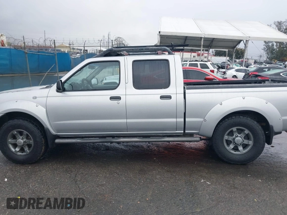 2004 Nissan Frontier XE z VIN 1N6ED29X04C423328, wystawiony jako IAAI lot #41514717 z przebiegiem 297 128 mil mil oraz . Historia ofert i sprzedaży dostępna na DreamBid. Obrazek 15.