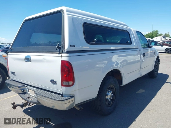 2002 Ford F-150 XL with VIN 2FTPF17Z02CA13589, listed as a IAAI auction lot 42203139 with 209,675 mi miles and . Bid and sale history available at DreamBid. Image 4.