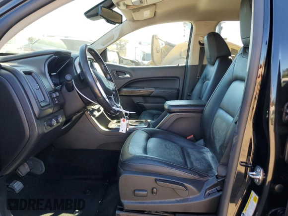 2016 GMC Canyon 4WD SLT with VIN 1GTP6DE11G1357147, listed as a Copart auction lot 77835344 with 106,890 mi miles and Salvage Title. Bid and sale history available at carsss.com. Image 7.