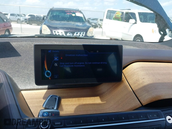 2014 BMW i3 with VIN WBY1Z4C50EV276518, listed as a IAAI auction lot 42631879 with 80,871 mi miles and . Bid and sale history available at DreamBid. Image 14.