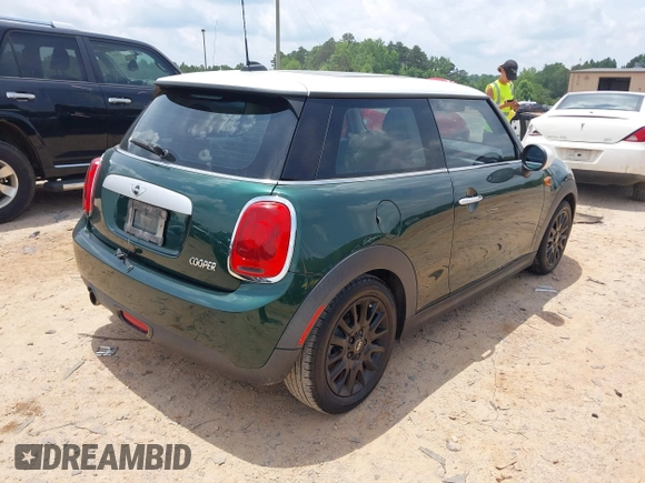2014 MINI Hardtop with VIN WMWXM5C53ET972847, listed as a IAAI auction lot 42502121 with 165,475 mi miles and . Bid and sale history available at DreamBid. Image 4.