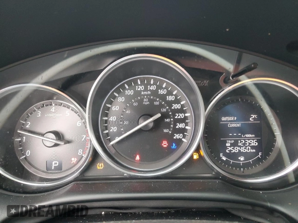 2015 Mazda CX-5 Sport with VIN JM3KE4BEXF0499688, listed as a Copart auction lot 88988095 with 258,460 mi miles and Salvage title. Bid and sale history available at DreamBid. Image 9.