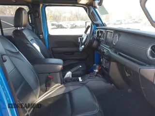 2022 Jeep Wrangler Unlimited Sahara z VIN 1C4JJXP64NW192452, wystawiony jako IAAI lot #41631295 z przebiegiem 23 738 mil mil oraz . Historia ofert i sprzedaży dostępna na DreamBid. Obrazek 5.