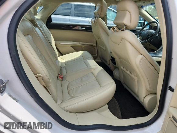 2015 Lincoln MKZ Hybrid z VIN 3LN6L2LU7FR609215, wystawiony jako Copart lot #63211665 z przebiegiem 149 636 mil mil oraz Nie do naprawy • Non repairable. Historia ofert i sprzedaży dostępna na DreamBid. Obrazek 10.