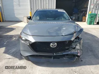 2021 Mazda 3 Premium Plus with VIN JM1BPBNYXM1403126, listed as a Copart auction lot 59971535 with 56,952 mi miles and Salvage title. Bid and sale history available at DreamBid. Image 5.