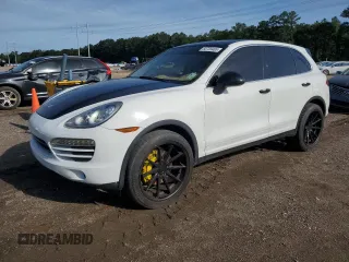 2014 Porsche Cayenne z VIN WP1AA2A26ELA07486, wystawiony jako Copart lot #60739465 z przebiegiem 169 151 mil mil oraz Czysty tytuł • Clean title. Historia ofert i sprzedaży dostępna na DreamBid. Obrazek 1.