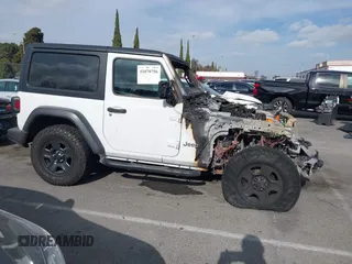 2018 Jeep Wrangler Sport S with VIN 1C4GJXAG0JW173936, listed as a IAAI auction lot 41070756 with Not Provided miles and . Bid and sale history available at DreamBid. Image 12.