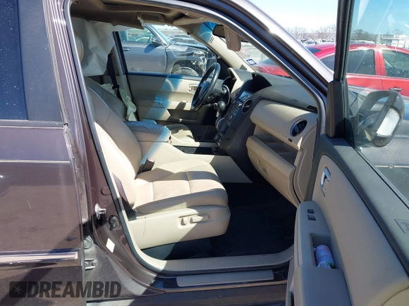 2012 Honda Pilot Touring with VIN 5FNYF4H99CB069996, listed as a IAAI auction lot 41809046 with 140,836 mi miles and . Bid and sale history available at DreamBid. Image 5.