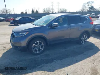 2018 Honda CR-V EX with VIN 7FARW2H5XJE047870, listed as a IAAI auction lot 41777145 with 50,358 mi miles and . Bid and sale history available at carsss.com. Image 2.