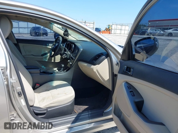 2014 Kia Optima LX with VIN KNAGM4A79E5470198, listed as a IAAI auction lot 42142484 with 169,140 mi miles. Bid and sale history available at carsss.com. Image 5.