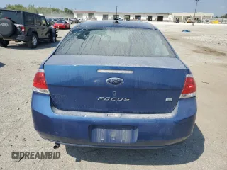 2009 Ford Focus SE with VIN 1FAHP35N69W173977, listed as a Copart auction lot 69018554 with 138,496 mi miles and Salvage Title. Bid and sale history available at carsss.com. Image 6.