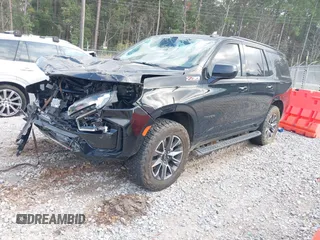 2021 Chevrolet Tahoe Z71 with VIN 1GNSKPKD8MR122190, listed as a IAAI auction lot 41587419 with 106,828 mi miles and . Bid and sale history available at DreamBid. Image 17.