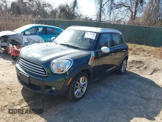 2013 MINI Countryman with VIN WMWZB3C57DWR35414, listed as a IAAI auction lot 41771890 with 141,561 mi miles and . Bid and sale history available at DreamBid. Image 2.
