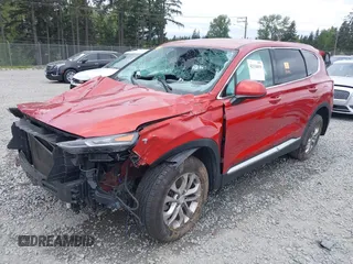 2020 Hyundai Santa Fe SEL with VIN 5NMS3CAD3LH200748, listed as a IAAI auction lot 42134819 with 66,254 mi miles and . Bid and sale history available at DreamBid. Image 2.