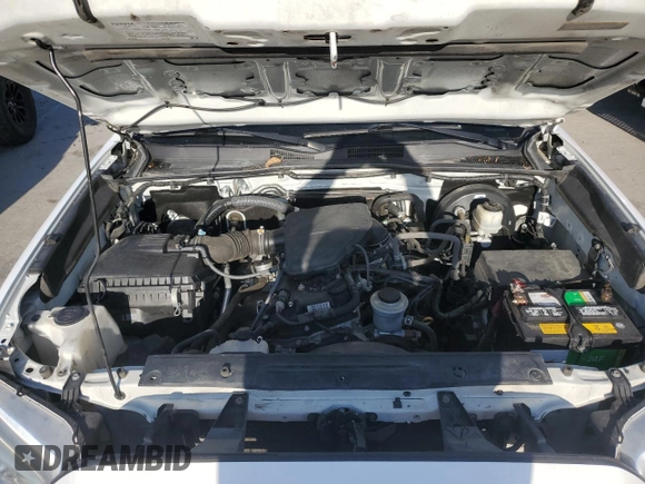 2017 Toyota Tacoma SR z VIN 5TFAX5GN4HX092764, wystawiony jako Copart lot #52150405 z przebiegiem 114 607 mil mil oraz Szkoda całkowita • Salvage title. Historia ofert i sprzedaży dostępna na DreamBid. Obrazek 11.