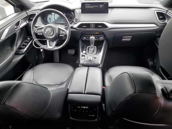 2021 Mazda CX-9 Carbon Edition с VIN JM3TCADY3M0517512, выставлен на аукционе Copart как лот 54240715 с пробегом 89 599 миль миль и Списание • Salvage title. История ставок и продаж доступна на DreamBid. Изображение 8.