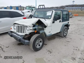 1998 Jeep Wrangler SE with VIN 1J4FY29P9WP793260, listed as a IAAI auction lot 41596990 with 90,766 mi miles. Bid and sale history available at carsss.com. Image 17.