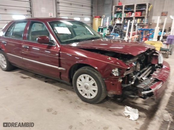 2004 Mercury Grand Marquis GS with VIN 2MEFM74W44X660876, listed as a IAAI auction lot 41915559 with 138,546 mi miles. Bid and sale history available at carsss.com. Image 1.