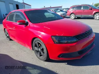 2012 Volkswagen Jetta TDI w/Premium & Nav z VIN 3VWLL7AJ5CM360240, wystawiony jako IAAI lot #42153402 z przebiegiem 146 308 mil mil oraz . Historia ofert i sprzedaży dostępna na DreamBid. Obrazek 1.