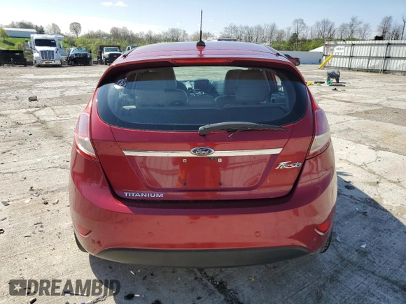2014 Ford Fiesta Titanium z VIN 3FADP4FJ0EM156814, wystawiony jako Copart lot #52028435 z przebiegiem 97 985 mil mil oraz Szkoda całkowita • Salvage title. Historia ofert i sprzedaży dostępna na DreamBid. Obrazek 6.