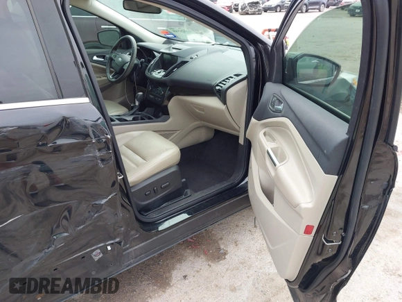 2017 Ford Escape Titanium with VIN 1FMCU0J93HUF10664, listed as a IAAI auction lot 41921588 with 88,377 mi miles. Bid and sale history available at carsss.com. Image 5.