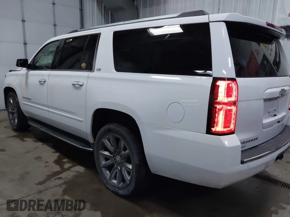 2016 Chevrolet Suburban LTZ with VIN 1GNSKJKC7GR244807, listed as a IAAI auction lot 41878696 with 136,433 mi miles and . Bid and sale history available at DreamBid. Image 3.