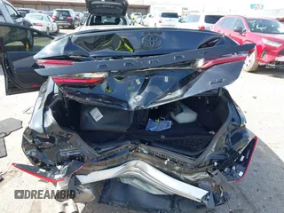 2025 Toyota Camry LE with VIN 4T1DAACK6SU029608, listed as a IAAI auction lot 41571751 with 9,030 mi miles and . Bid and sale history available at DreamBid. Image 6.