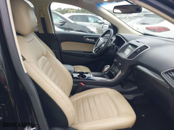 2016 Ford Edge SEL with VIN 2FMPK3J89GBC30025, listed as a IAAI auction lot 41509345 with 84,671 mi miles. Bid and sale history available at carsss.com. Image 5.