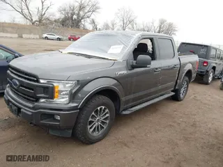 2018 Ford F-150 XL with VIN 1FTEW1EG1JKF75729, listed as a IAAI auction lot 41532591 with 105,714 mi miles. Bid and sale history available at carsss.com. Image 2.