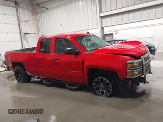2014 Chevrolet Silverado 1500 LT with VIN 1GCVKREC2EZ407599, listed as a IAAI auction lot 41513210 with 168,352 mi miles and . Bid and sale history available at DreamBid. Image 13.