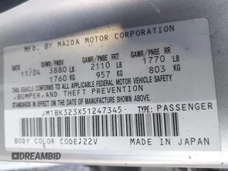 2005 Mazda 3 s with VIN JM1BK323X51247345, listed as a IAAI auction lot 41761337 with 156,060 mi miles. Bid and sale history available at carsss.com. Image 9.