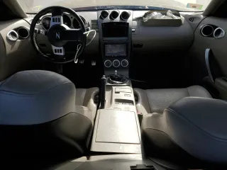 2004 Nissan 350Z Touring with VIN JN1AZ34D64T151960, listed as a Copart auction lot 69607824 with 106,607 mi miles and Salvage Title. Bid and sale history available at carsss.com. Image 8.