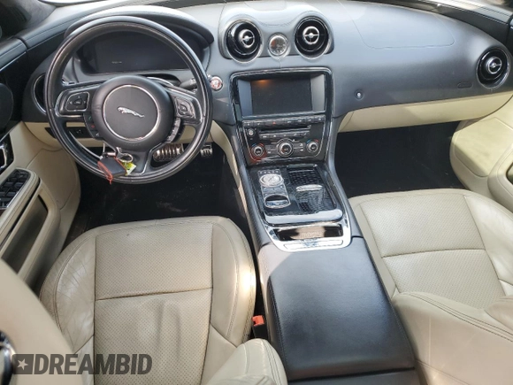 2015 Jaguar XJ with VIN SAJWA1CZ9F8V88418, listed as a Copart auction lot 45547965 with 82,423 mi miles and Salvage Title. Bid and sale history available at carsss.com. Image 8.