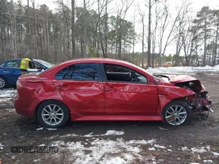 2016 Mitsubishi Lancer SE with VIN JA32V2FW7GU004159, listed as a IAAI auction lot 41401386 with 100,536 mi miles. Bid and sale history available at carsss.com. Image 12.