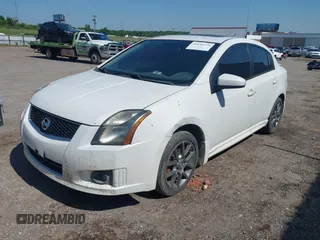 2012 Nissan Sentra SE-R z VIN 3N1BB6AP2CL670385, wystawiony jako IAAI lot #42431771 z przebiegiem 186 513 mil mil oraz . Historia ofert i sprzedaży dostępna na DreamBid. Obrazek 2.