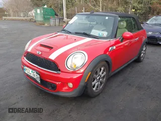 2012 MINI Convertible S with VIN WMWZP3C5XCT249627, listed as a IAAI auction lot 41430331 with 157,533 mi miles and . Bid and sale history available at DreamBid. Image 2.