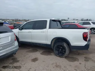 2023 Honda Ridgeline Black Edition with VIN 5FPYK3F82PB020278, listed as a IAAI auction lot 41462889 with 12,100 mi miles. Bid and sale history available at carsss.com. Image 14.