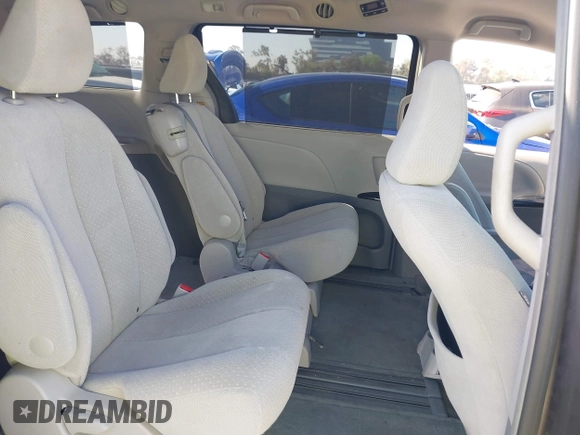 2014 Toyota Sienna LE AAS with VIN 5TDKK3DC6ES521706, listed as a IAAI auction lot 41999188 with 104,867 mi miles. Bid and sale history available at carsss.com. Image 8.