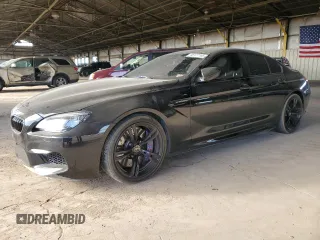 2015 BMW M6 z VIN WBS6C9C52FD467539, wystawiony jako Copart lot #45177105 z przebiegiem 76 504 mil mil oraz Tytuł czysty. Historia ofert i sprzedaży dostępna na DreamBid. Obrazek 1.