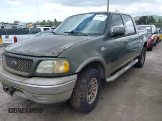 2003 Ford F-150 XLT with VIN 1FTRW08L43KC83824, listed as a IAAI auction lot 41885702 with 242,195 mi miles. Bid and sale history available at carsss.com. Image 2.