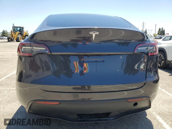 2024 Tesla Model Y Long Range with VIN 7SAYGDEEXRA215975, listed as a Copart auction lot 56705585 with 20,554 mi miles and Salvage Title. Bid and sale history available at DreamBid. Image 6.